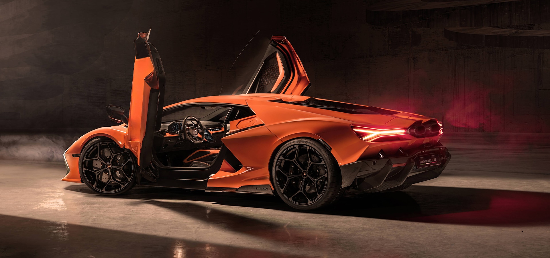 A sideview image of the Lamborghini Revuelto with its doors open